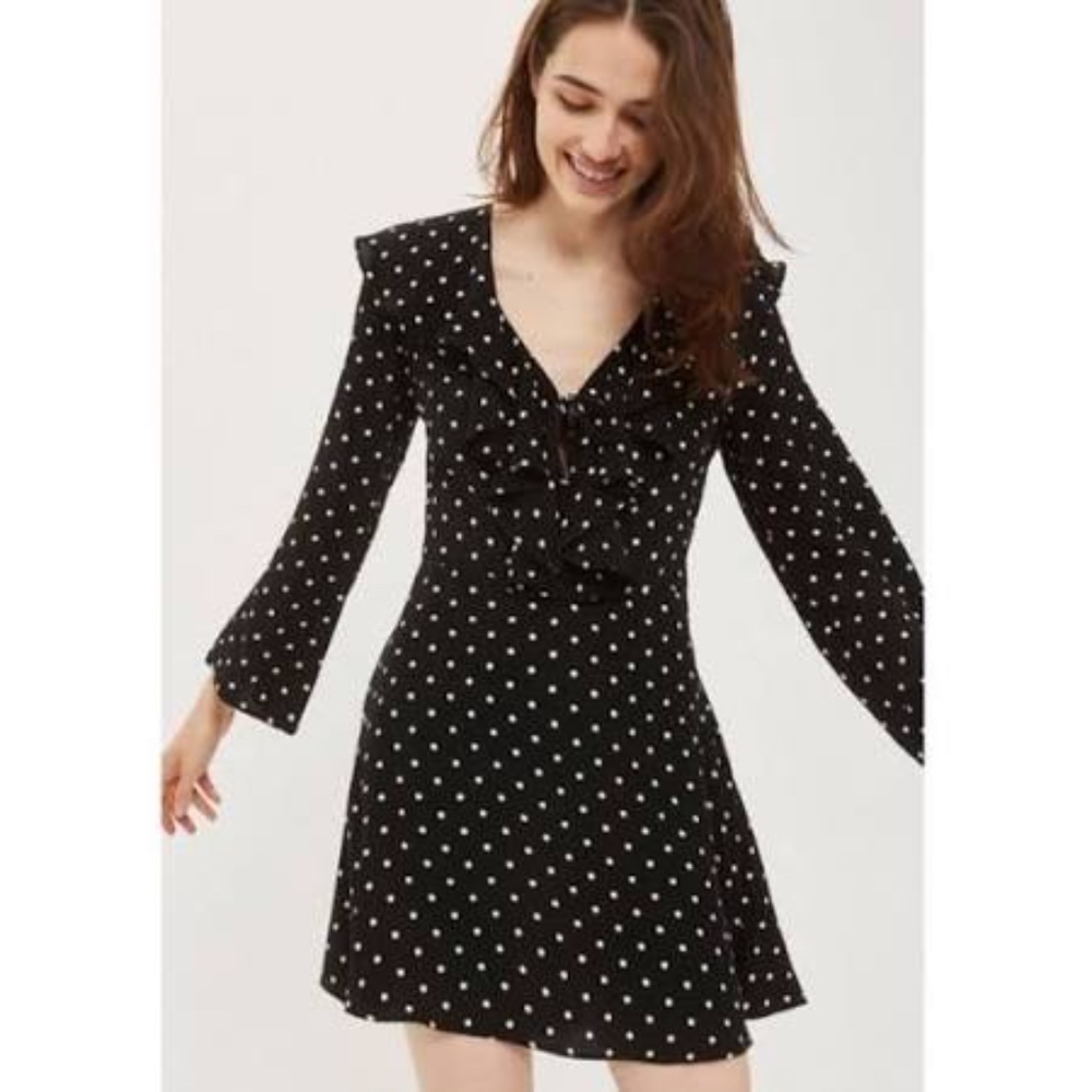 Black and white ruffled mini dress